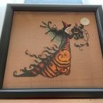 A fully framed and mounted needlework