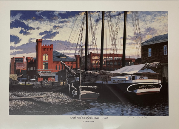 historical brick buildings and dock with masted ship