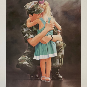 soldier in military fatigues embracing child