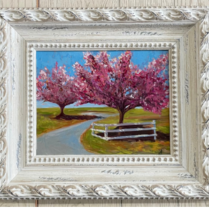 painting of cherry trees in bloom along road with picket fence